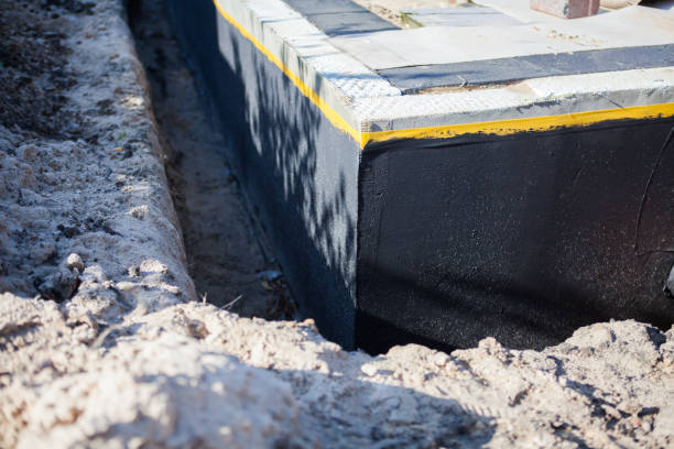 Professional Waterproofing technician working in Germantown, KY